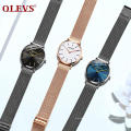 OLEVS Marca 5868 Correa de acero de malla Relojes de pulsera de cuarzo para hombres y mujeres Reloj de pareja impermeable fino de moda Reloj unisex